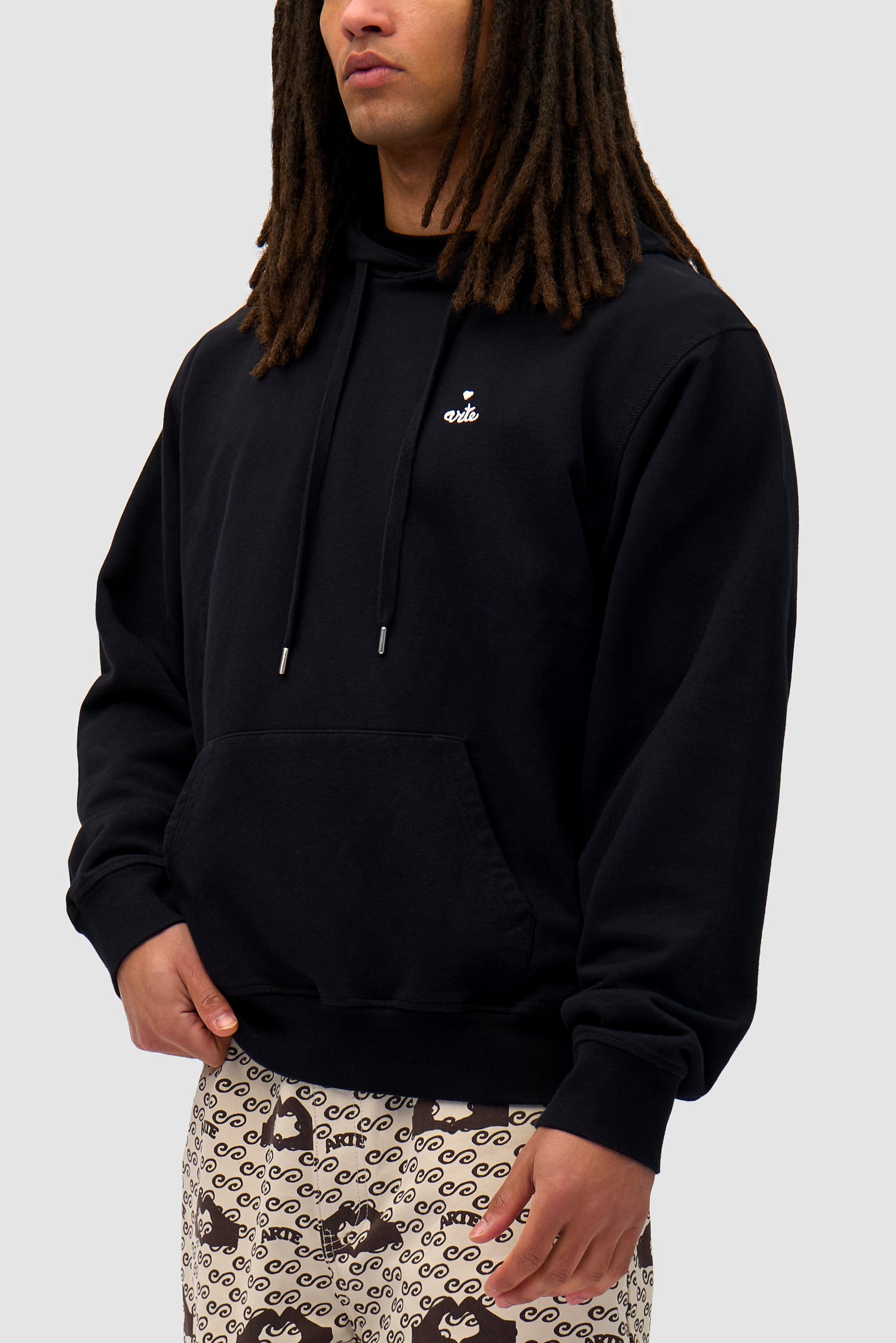 Detail view of Heart Logo Hoodie in Black