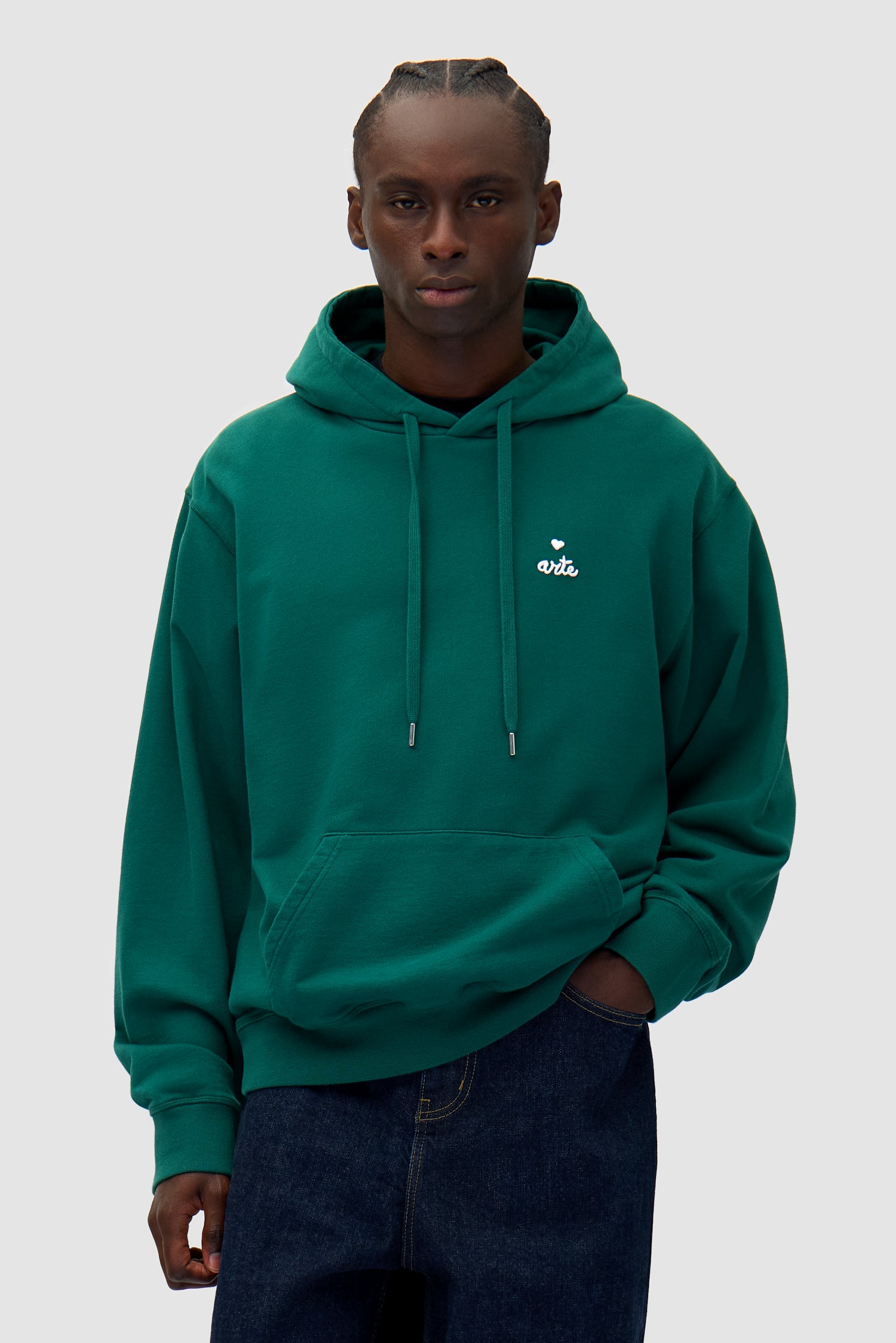 Heart Logo Hoodie in Green worn by a model, half-body front view