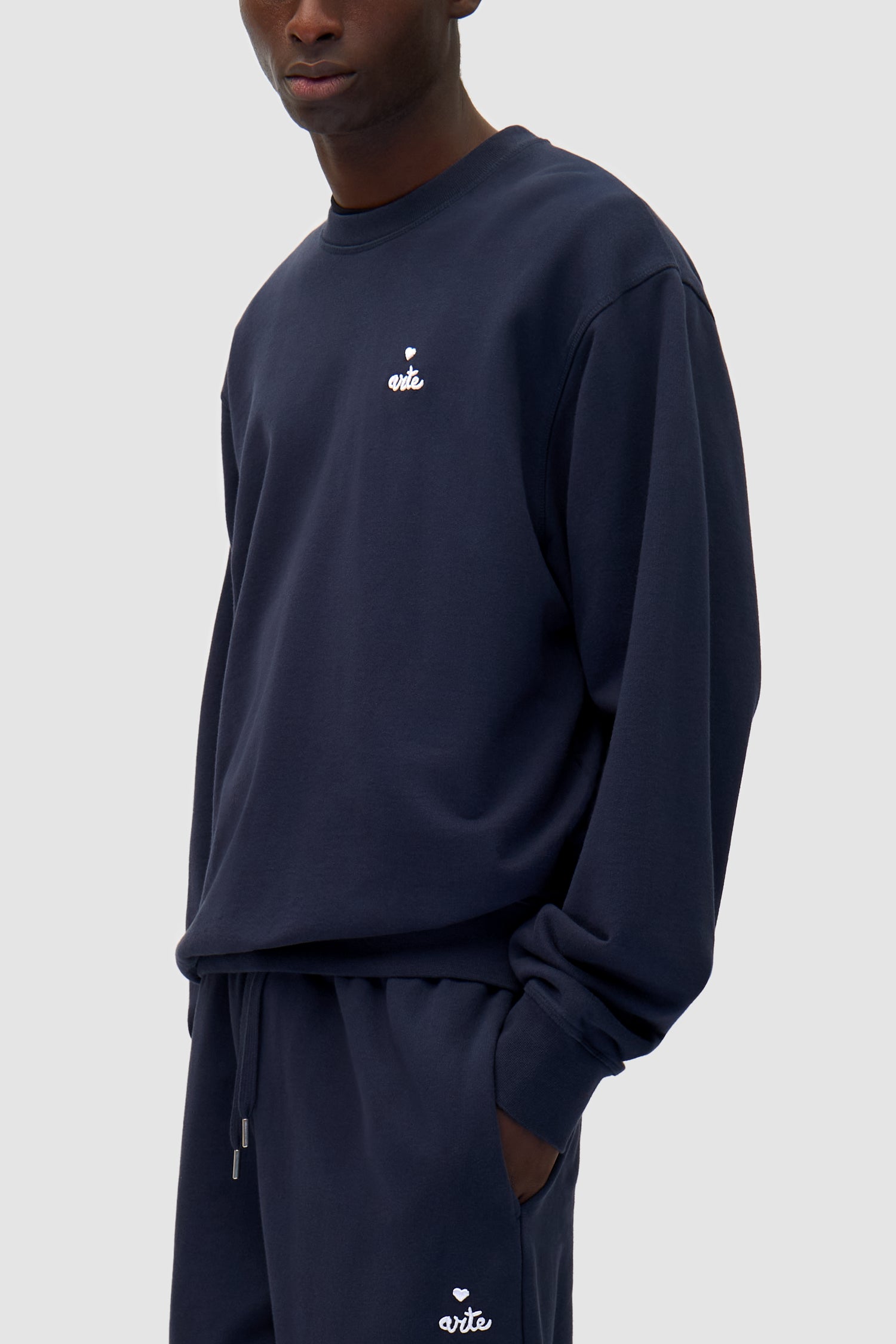 Detail view of Heart Crewneck in Navy