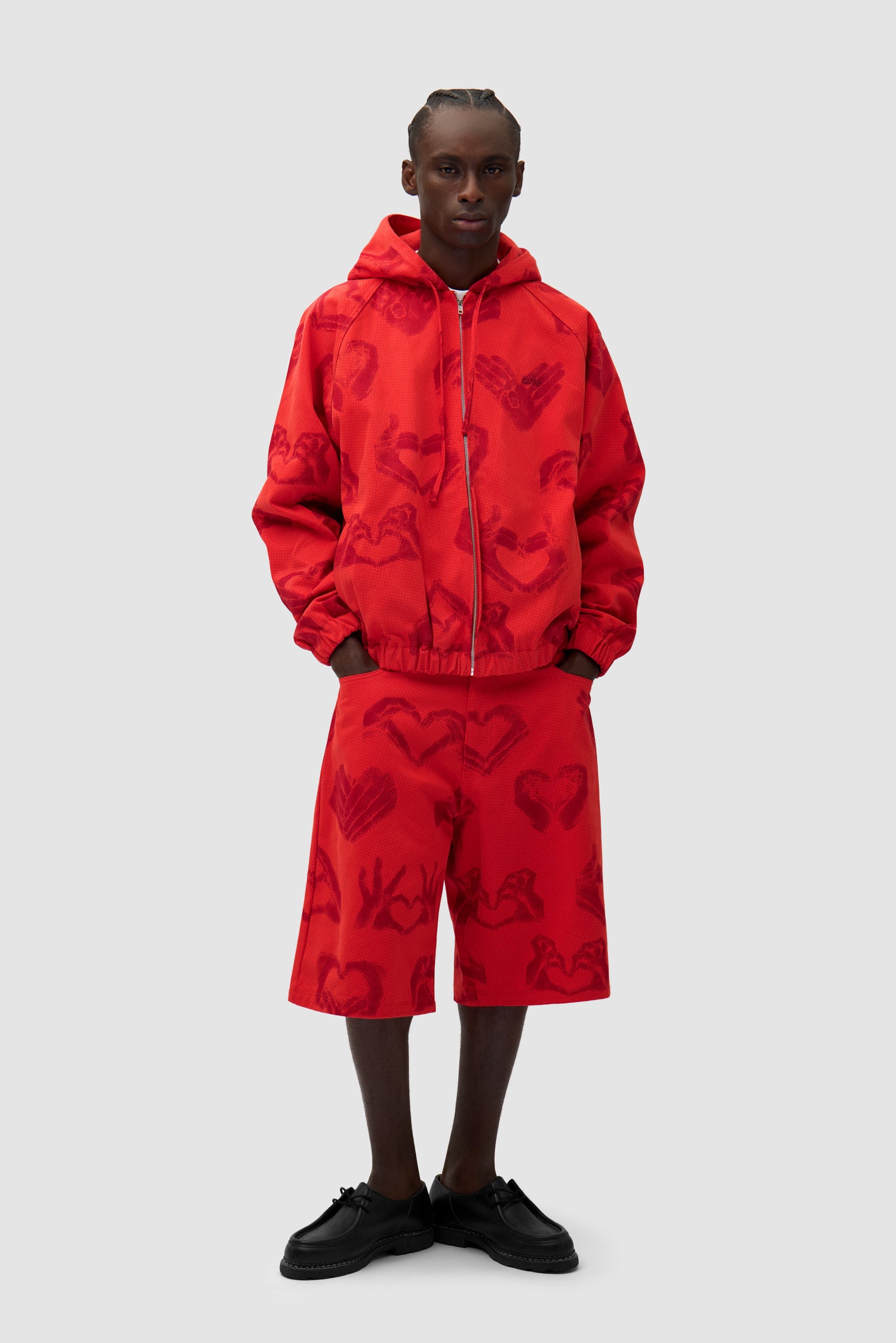 Hands Print Jacket in Red worn by a model, full-body front view