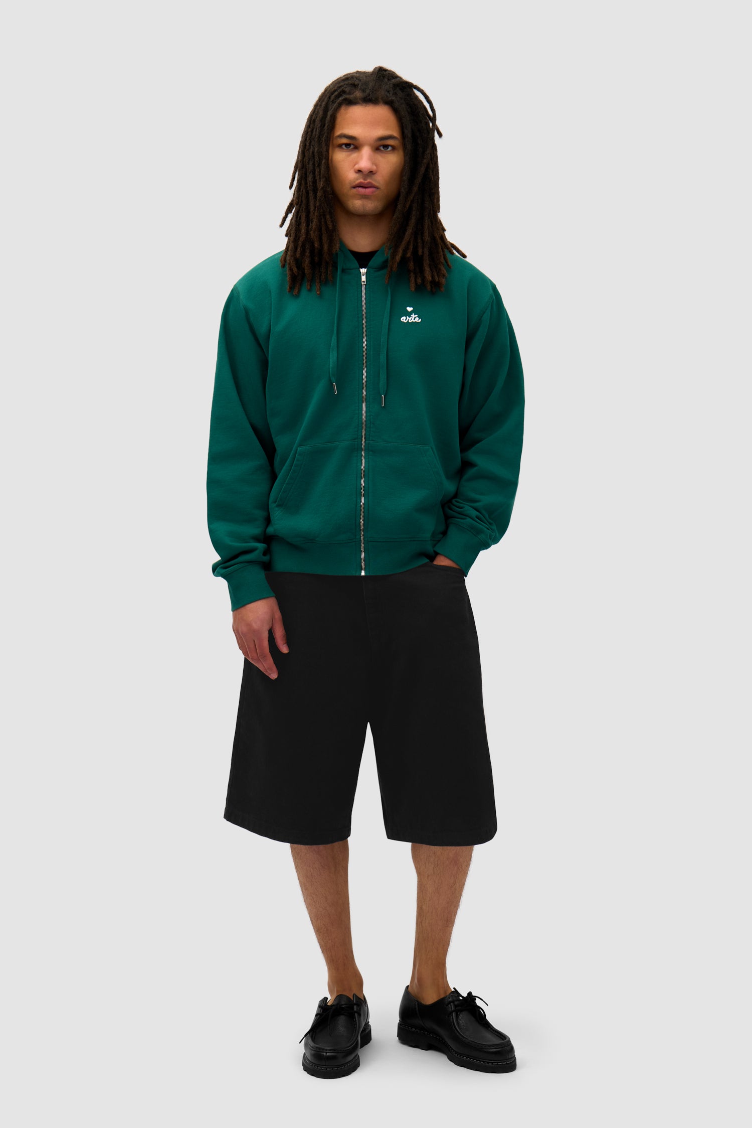 Heart Zip Hoodie in Green worn by a model, full-body front view