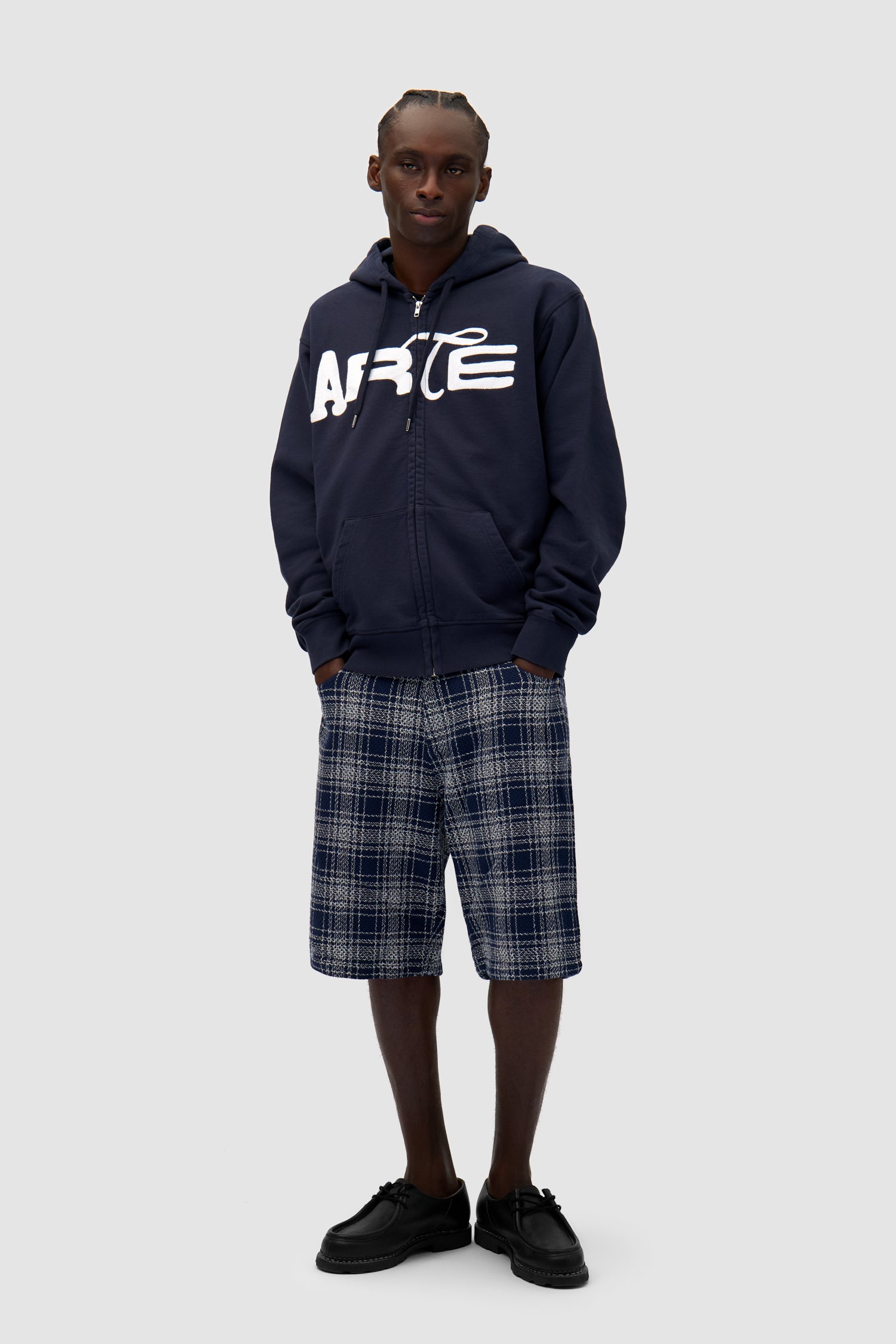 Energy Zip Hoodie in Navy worn by a model, full-body front view