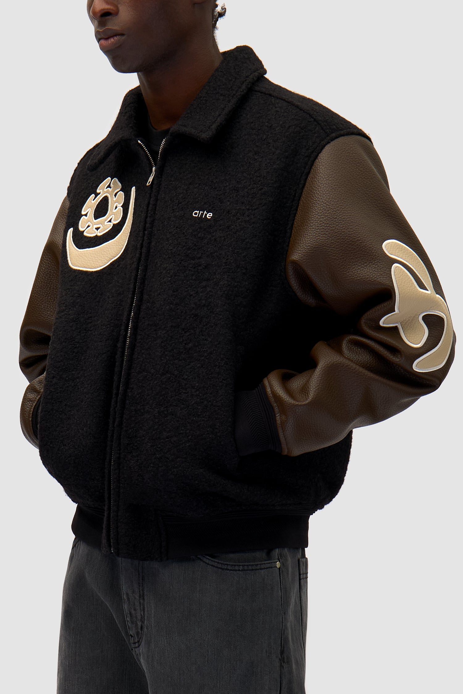 Detail view of Varsity Jacket in Black/Brown
