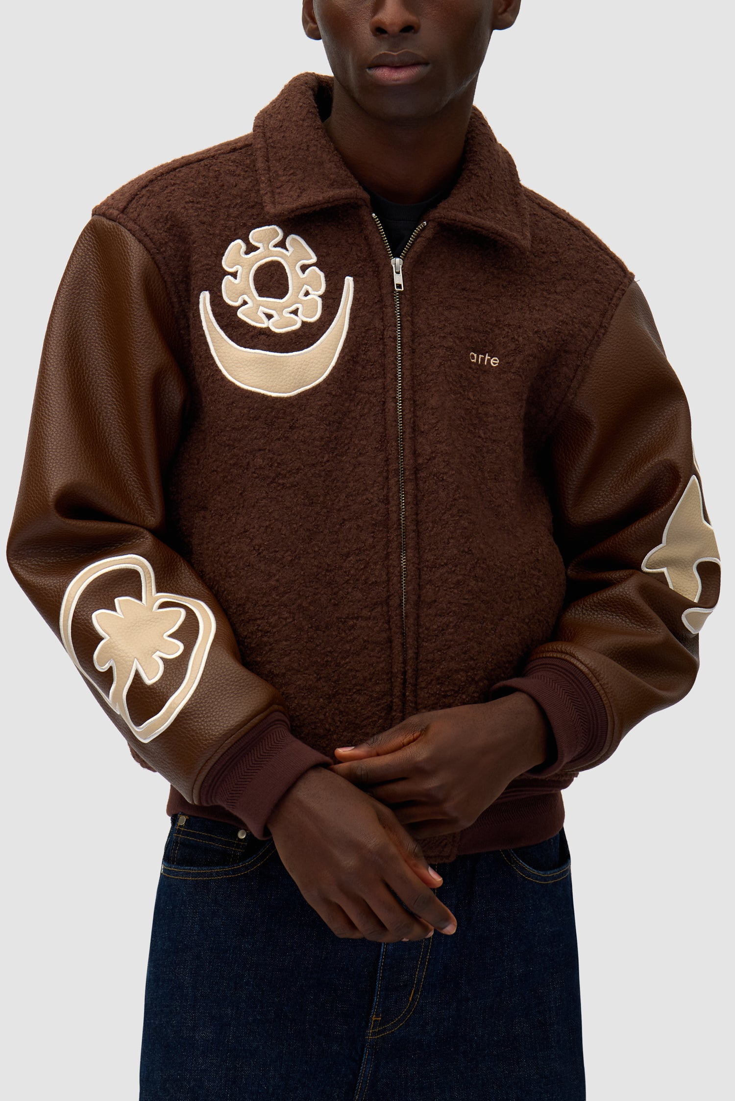 Varsity Jacket in Brown/Brown worn by a model, half-body detailed view