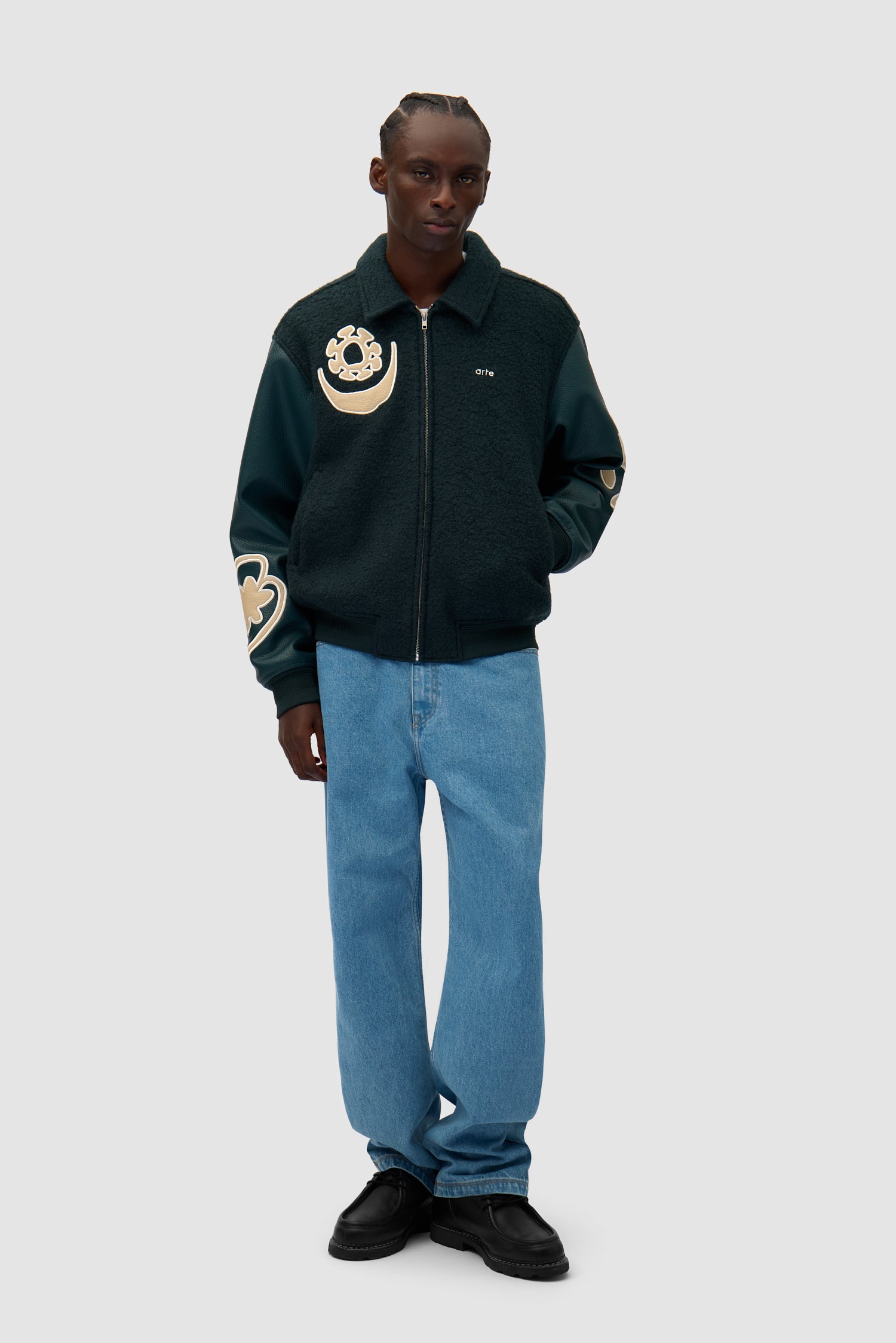 Varsity Jacket in Green worn by a model, full-body front view