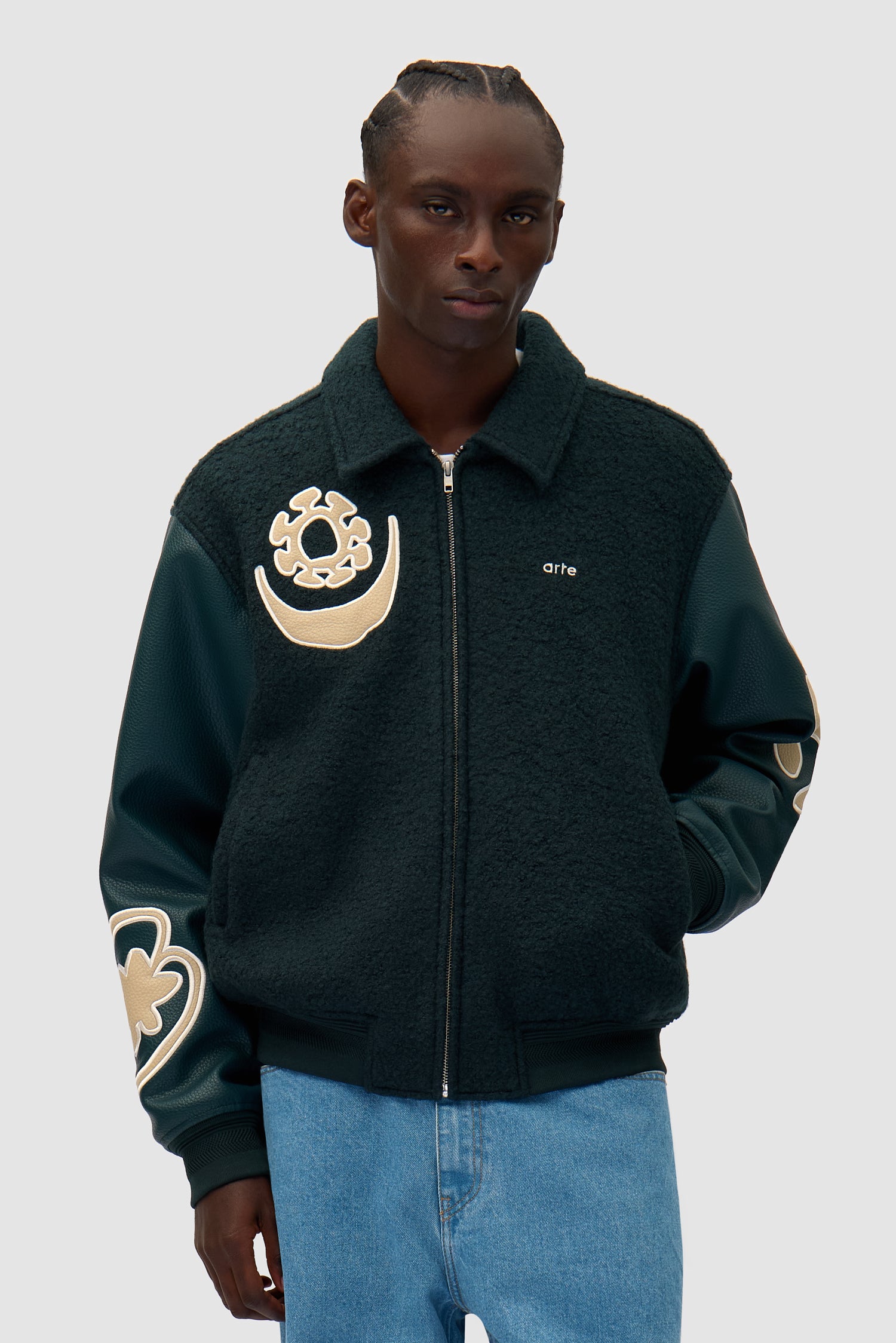Varsity Jacket in Green worn by a model, half-body front view