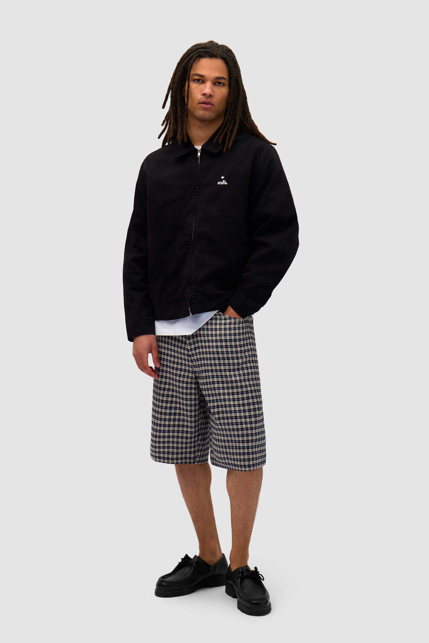 Heart Logo Jacket in Black worn by a model, full-body front view