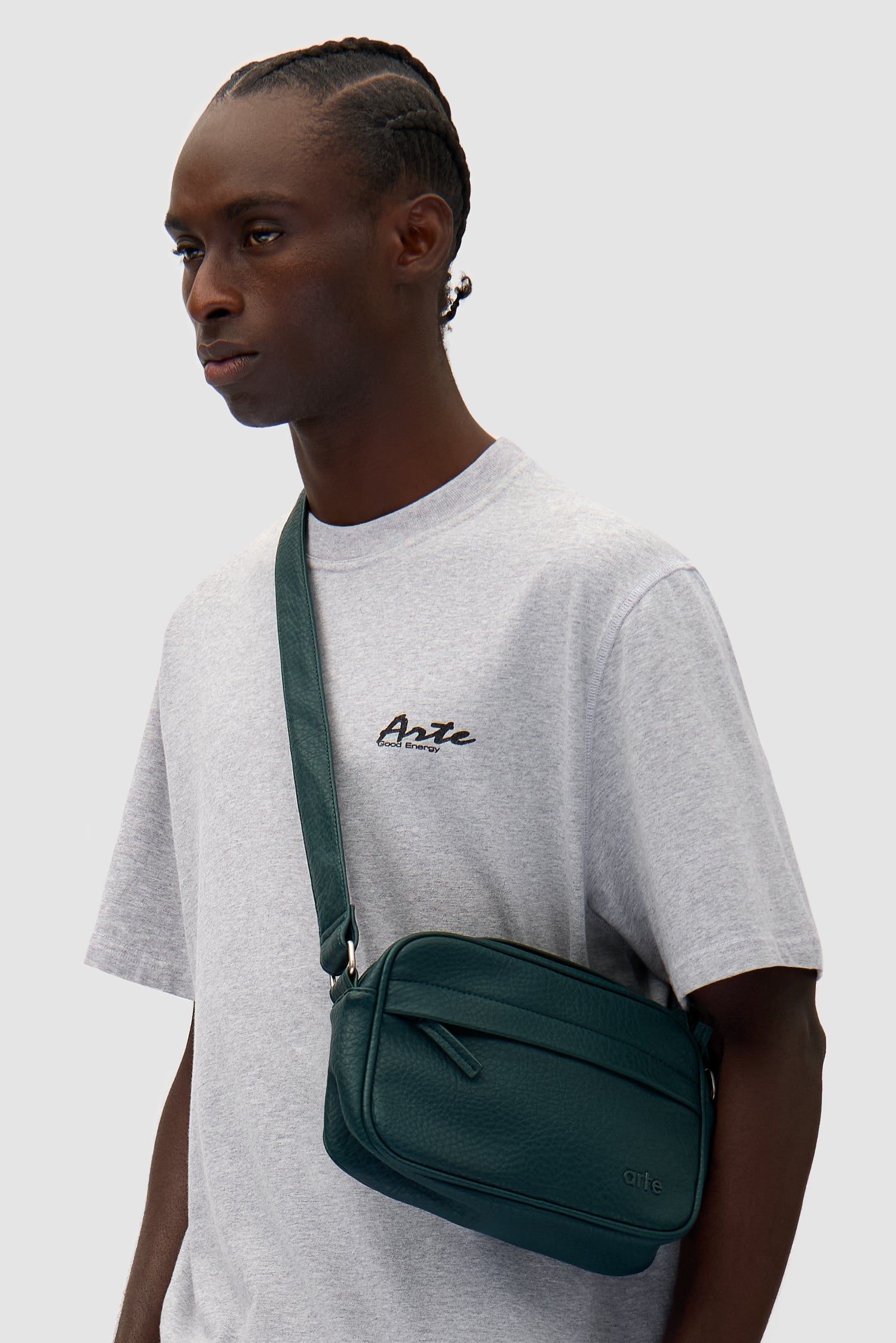 Texture Leather Bag in Green worn by a model, half-body front view