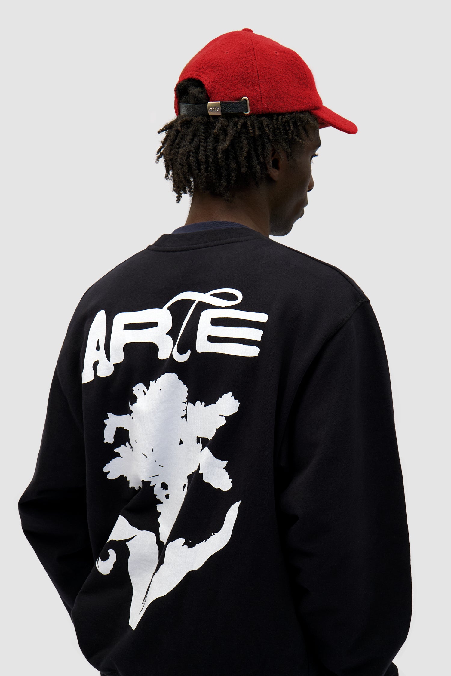 Wool Cap in Red worn by a model, full-body front view