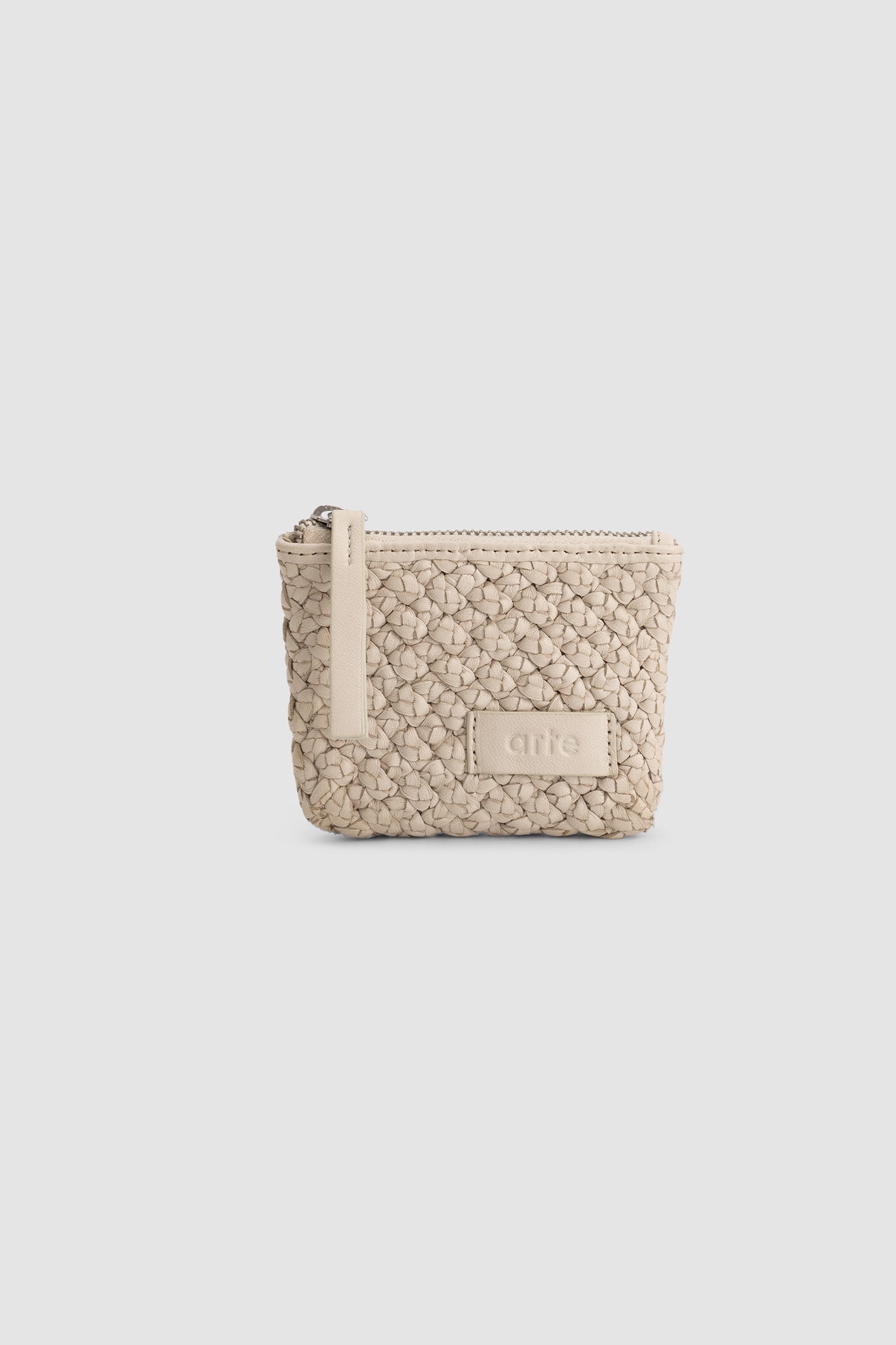 Braided Leather Wallet in Cream worn by a model, half-body front view