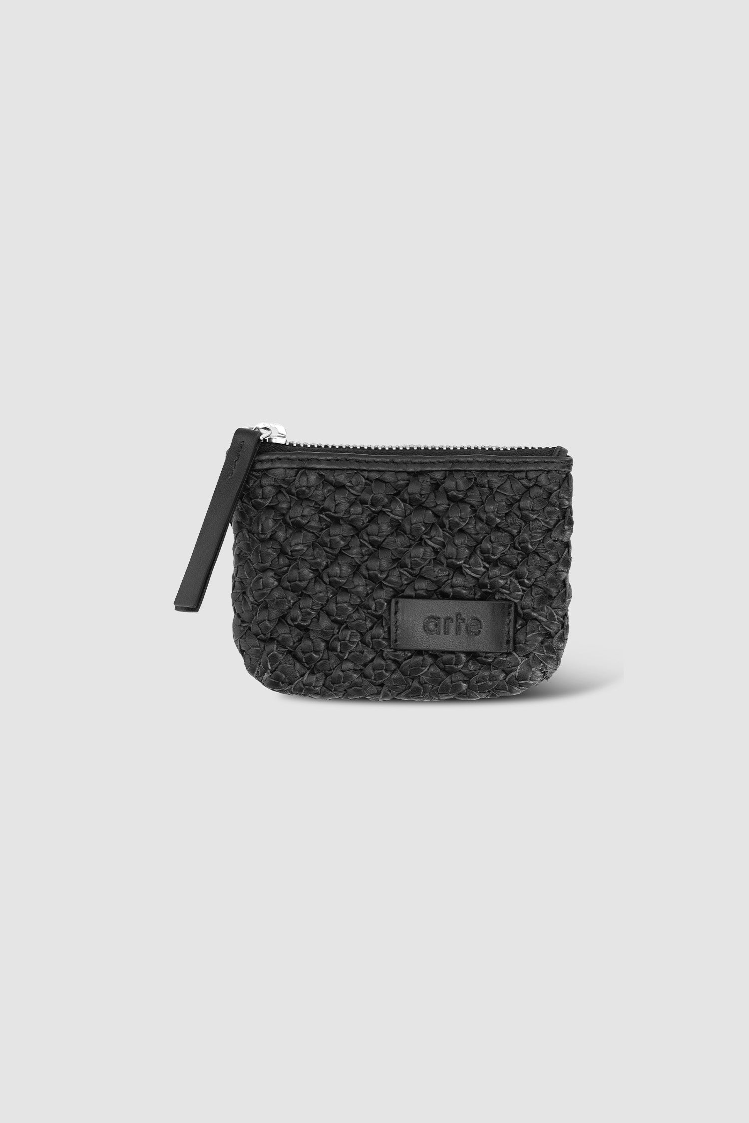 Braided Leather Wallet in Black worn by a model, half-body front view