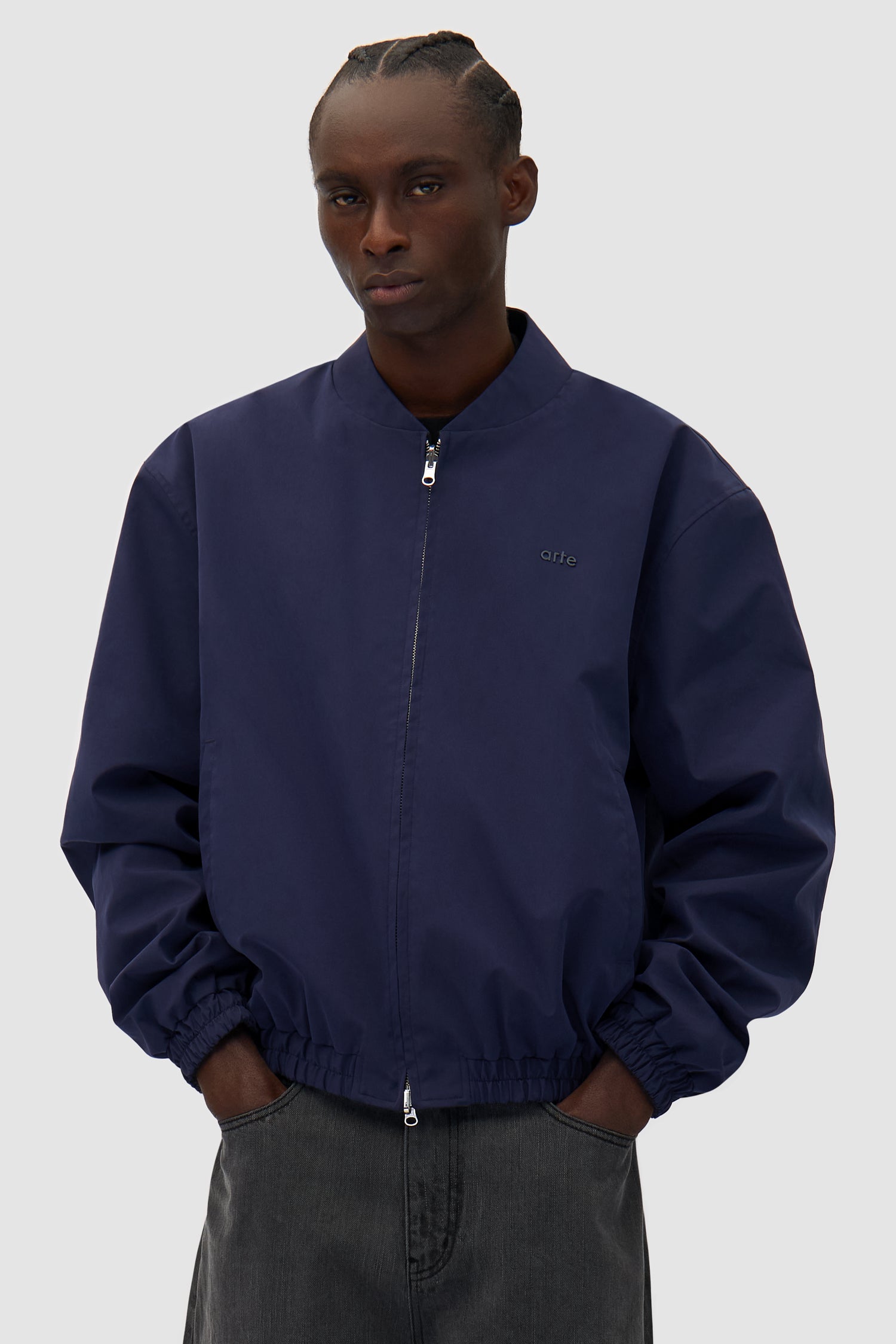 Reversible Nylon Jacket in Navy/Green worn by a model, half-body front view