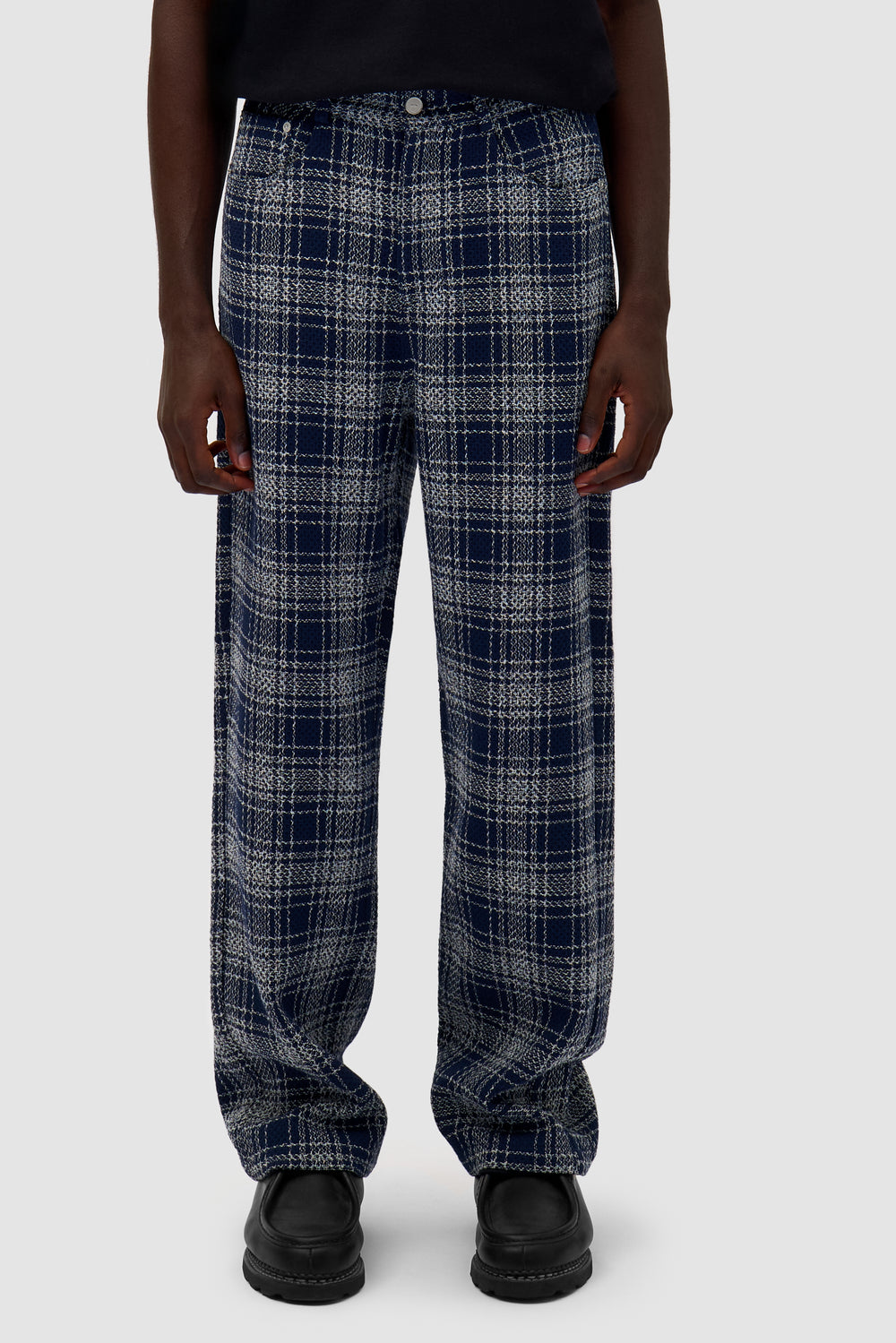 Square Fabric Pants in Plaid worn by a model, half-body front view