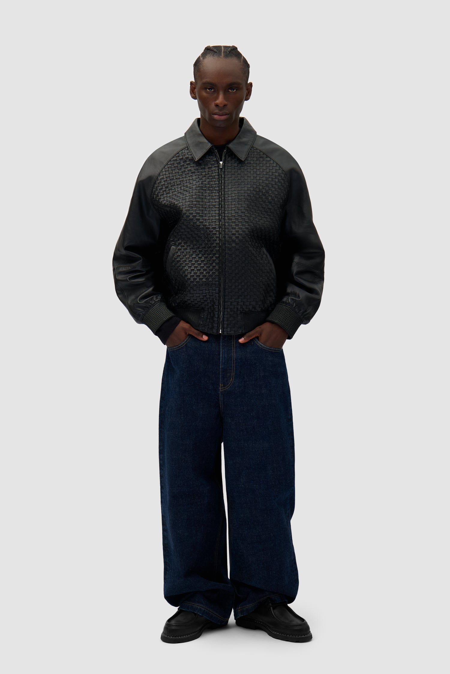 Square Leather Jacket in Black worn by a model, full-body front view