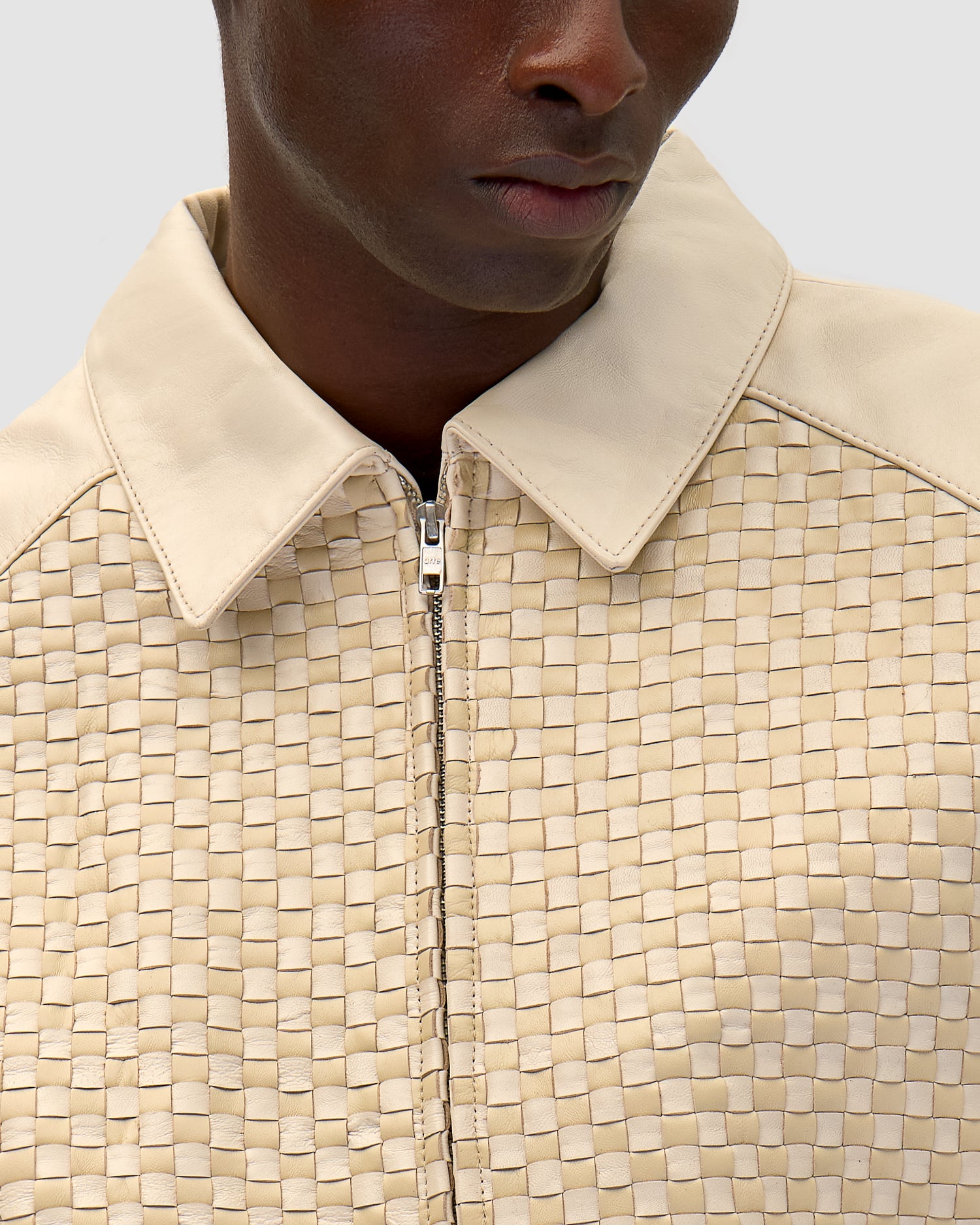 Square Leather Jacket in Cream worn by a model, half-body detailed view