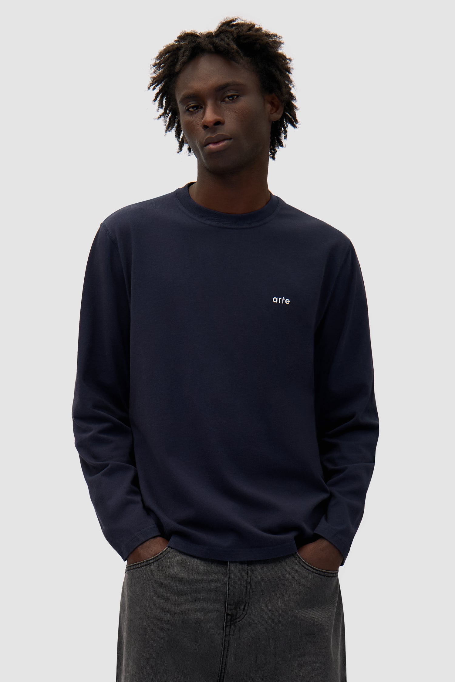 Good Energy Longsleeve in Navy worn by a model, half-body front view