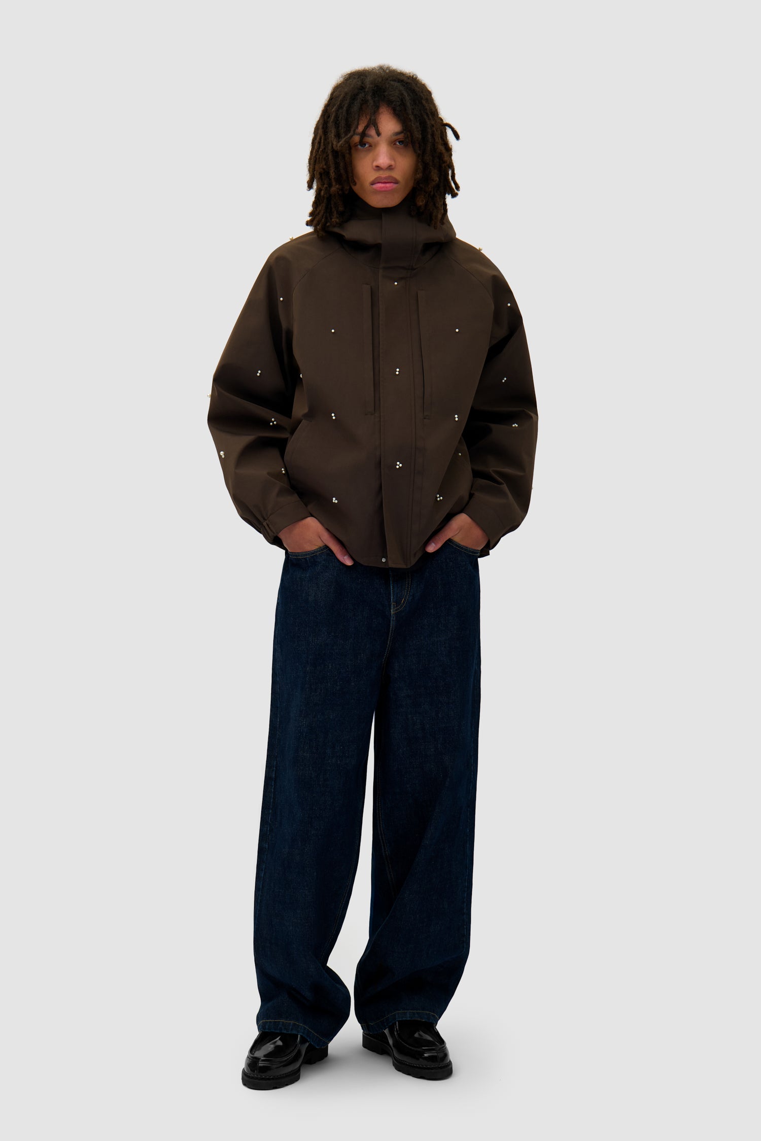 Jacket Beads Jacket in Brown worn by a model, full-body front view