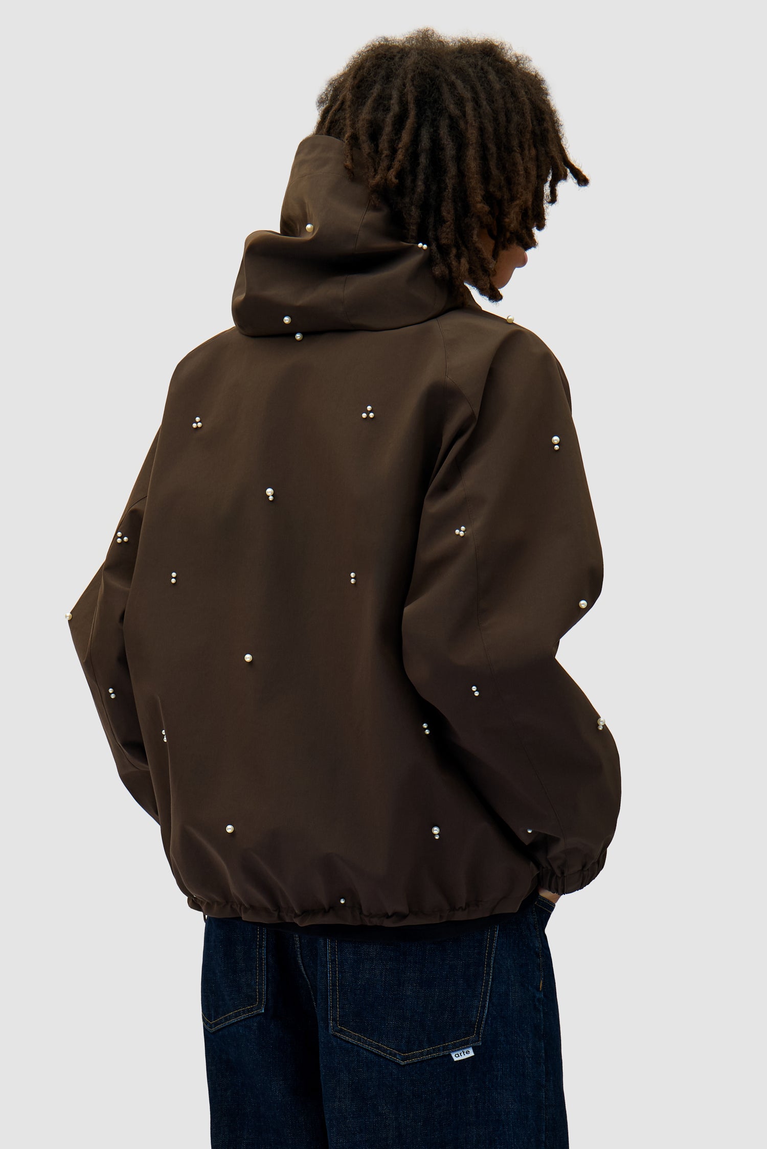 Jacket Beads Jacket in Brown worn by a model, half-body back view