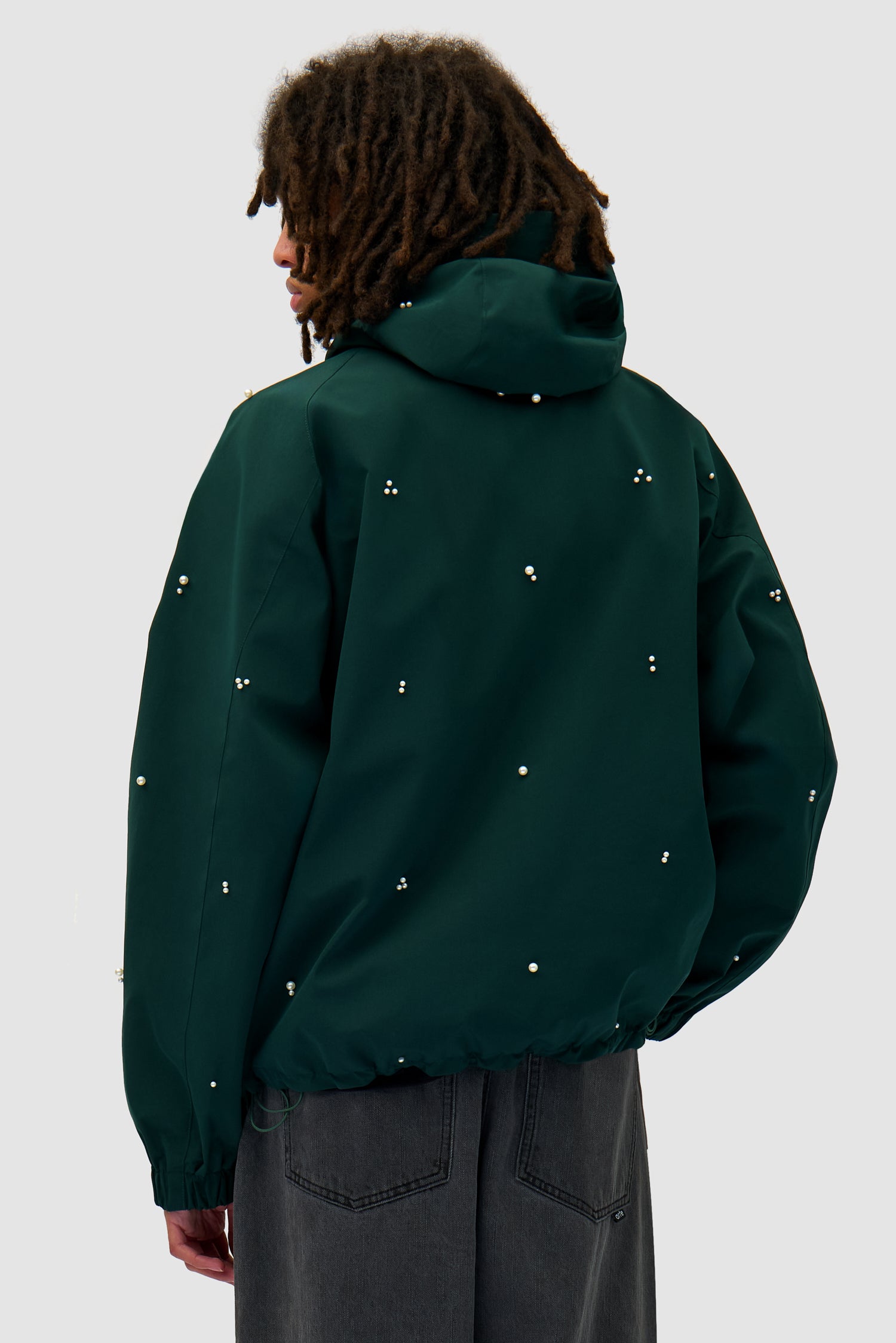 Jacket Beads Jacket in Green worn by a model, half-body back view