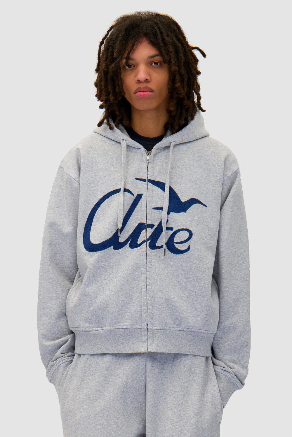 Zipper Hoodie in Grey worn by a model, half-body front view