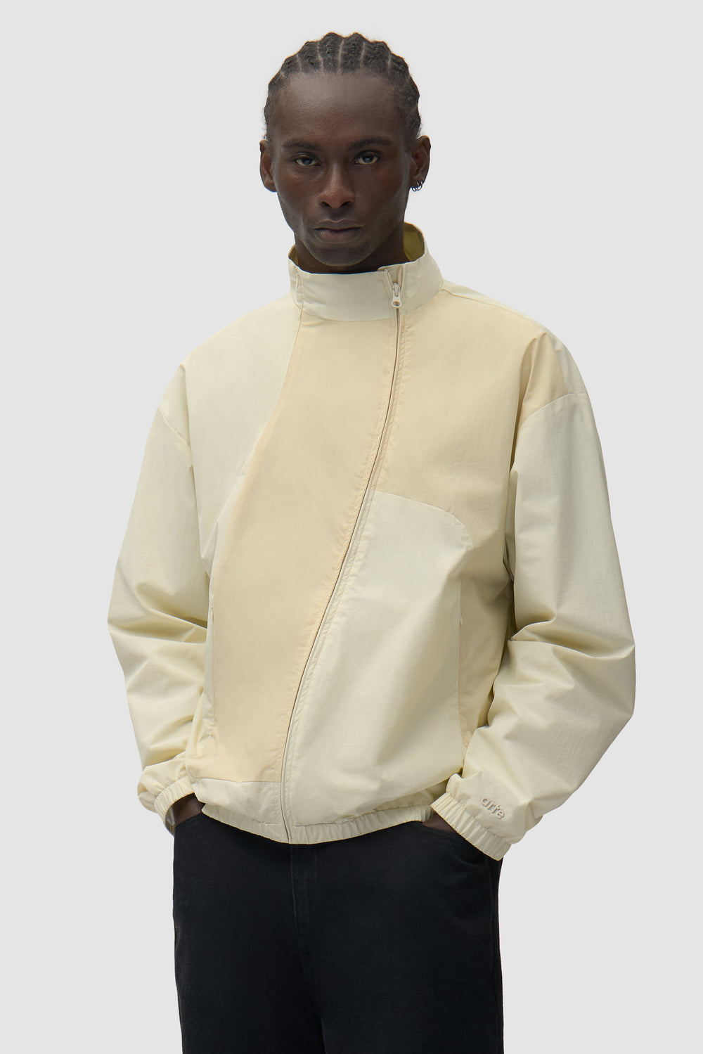 Curve Zipper Jacket in Cream worn by a model, half-body front view