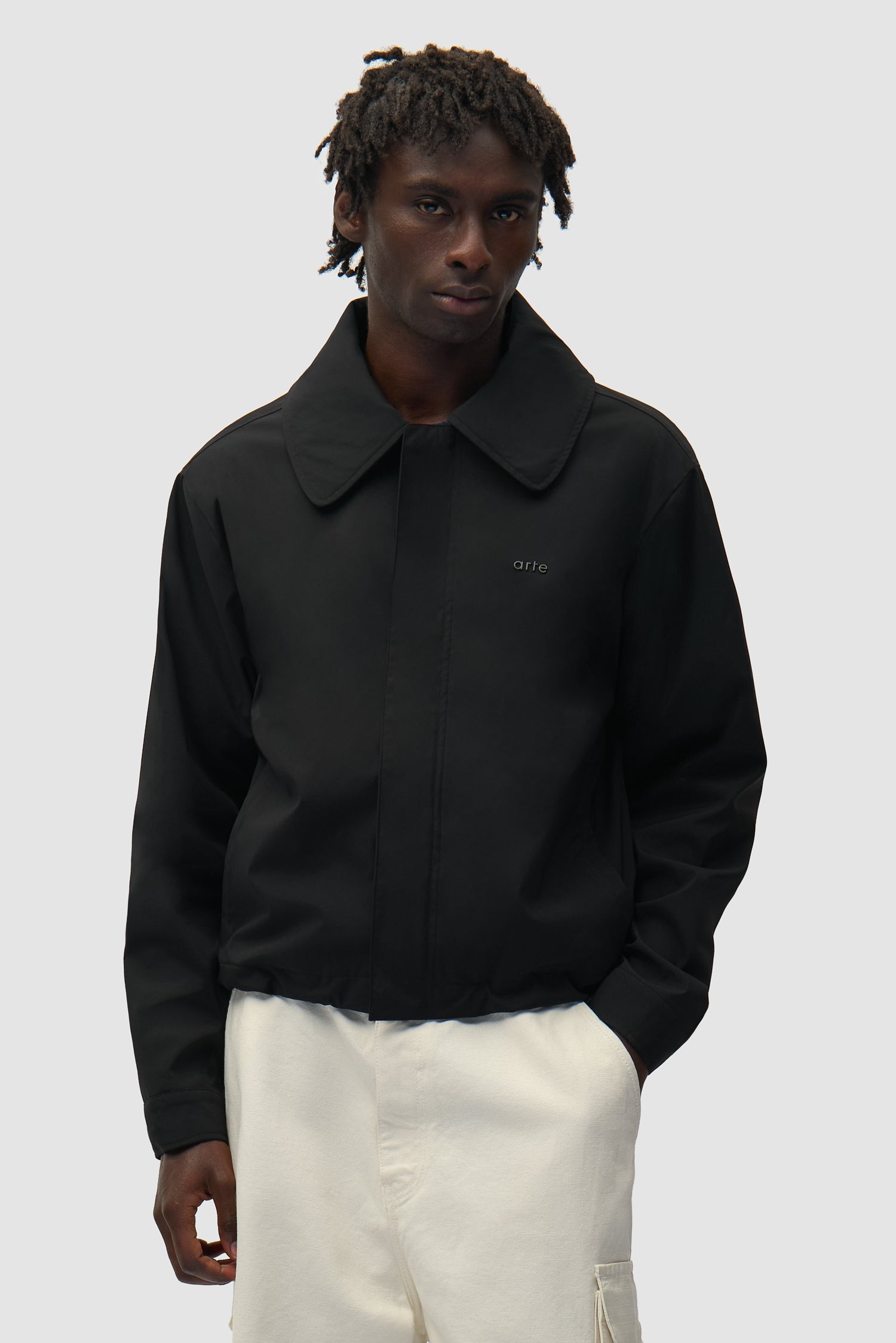 Big Collar Nylon Jacket in Black worn by a model, half-body front view