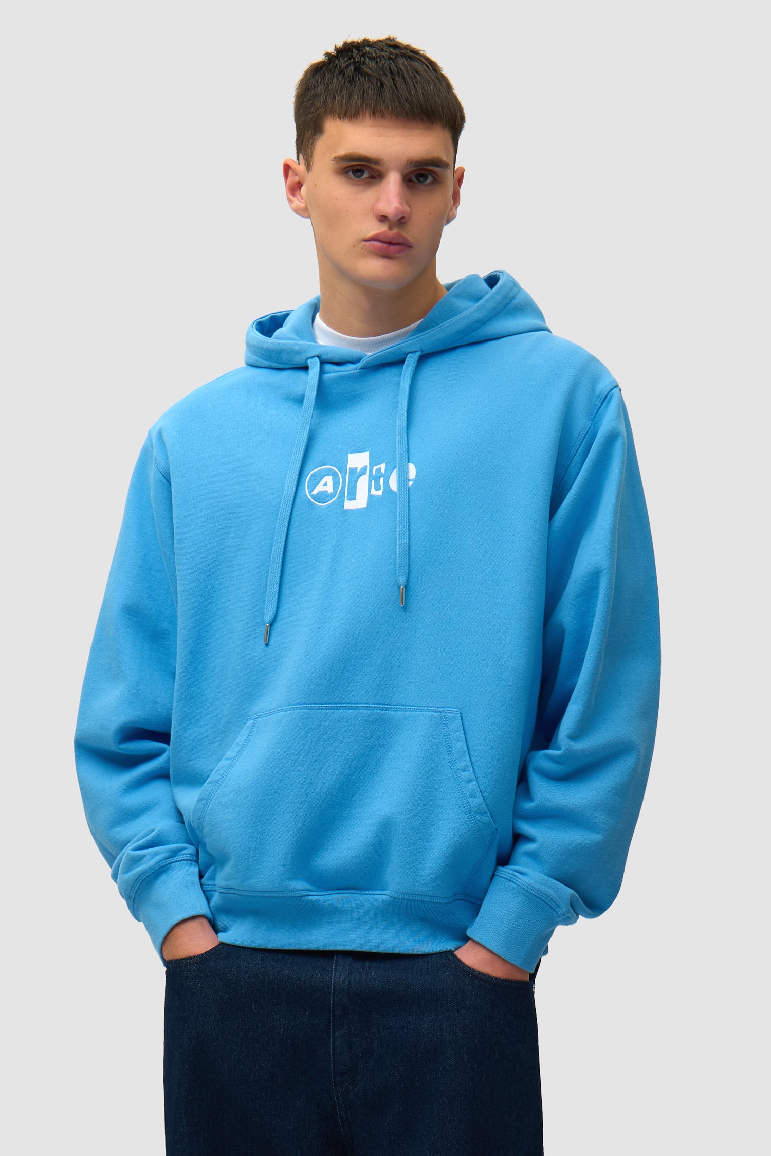 Collage Logo Hoodie in Blue worn by a model, half-body front view