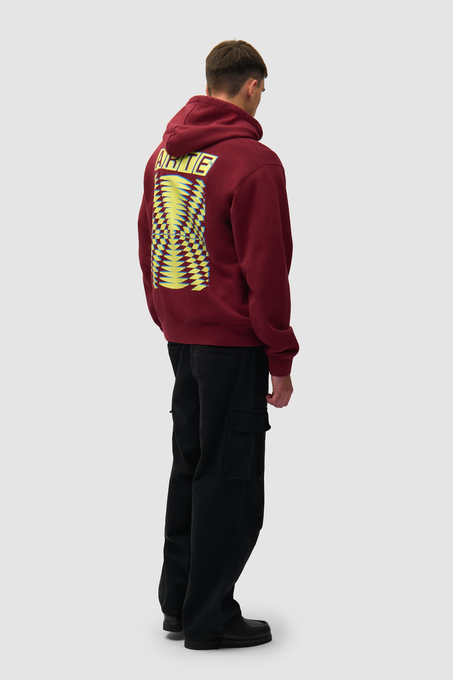 Back Abstract Hoodie in Bordeaux worn by a model, full-body front view