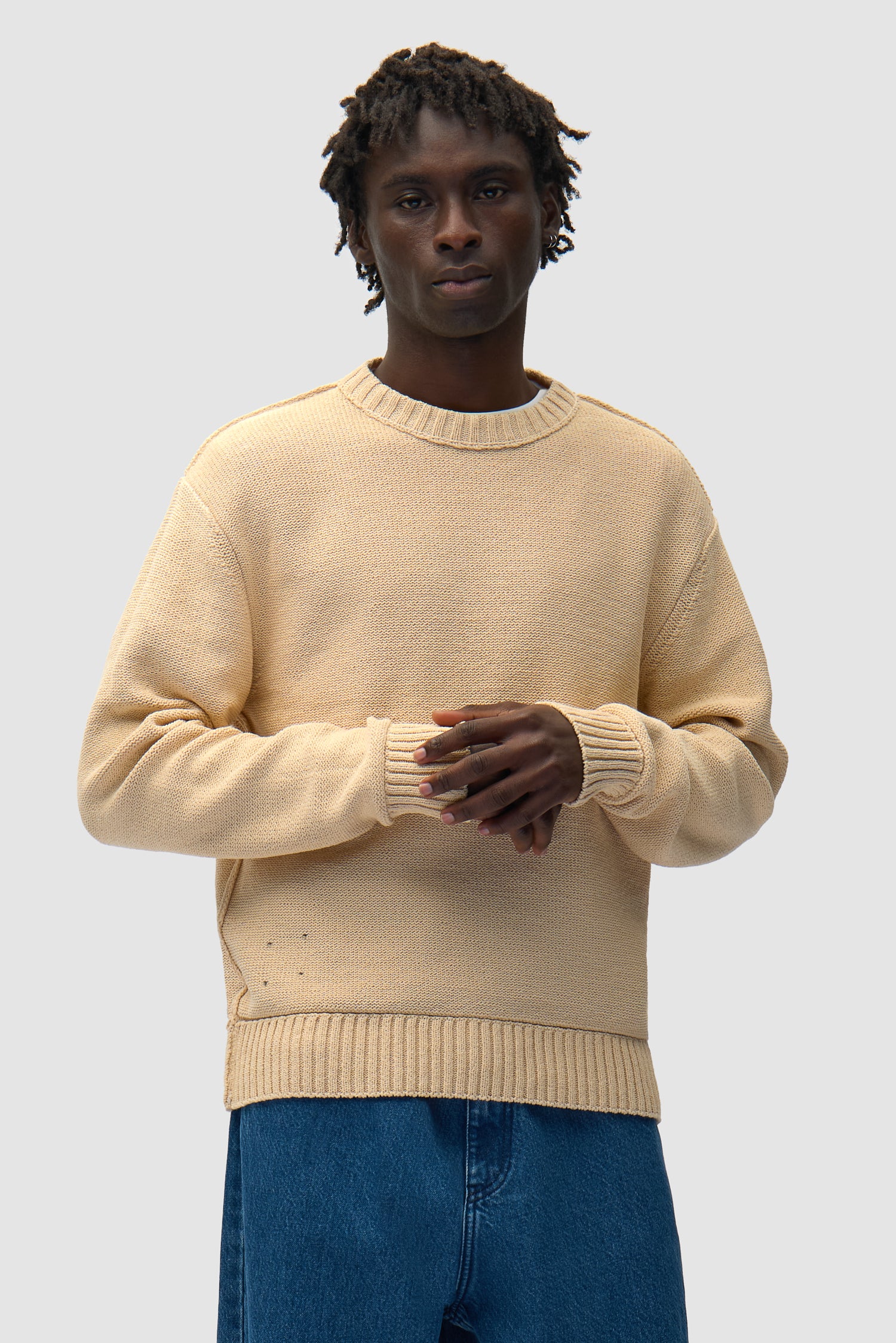 Reversible Label Knit in Cream Reversed worn by a model, half-body front view