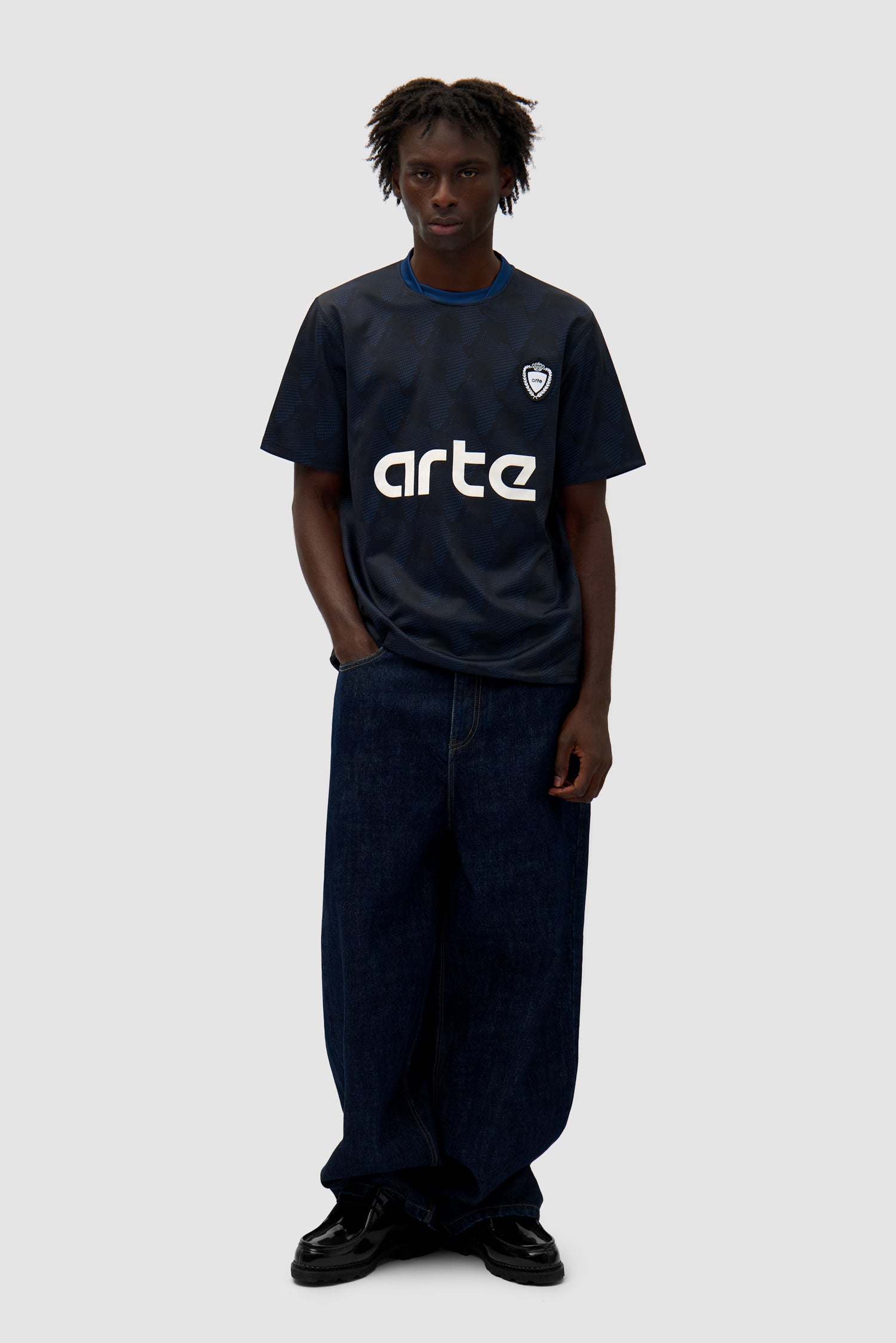 Footbal Shirt in Navy worn by a model, full-body front view