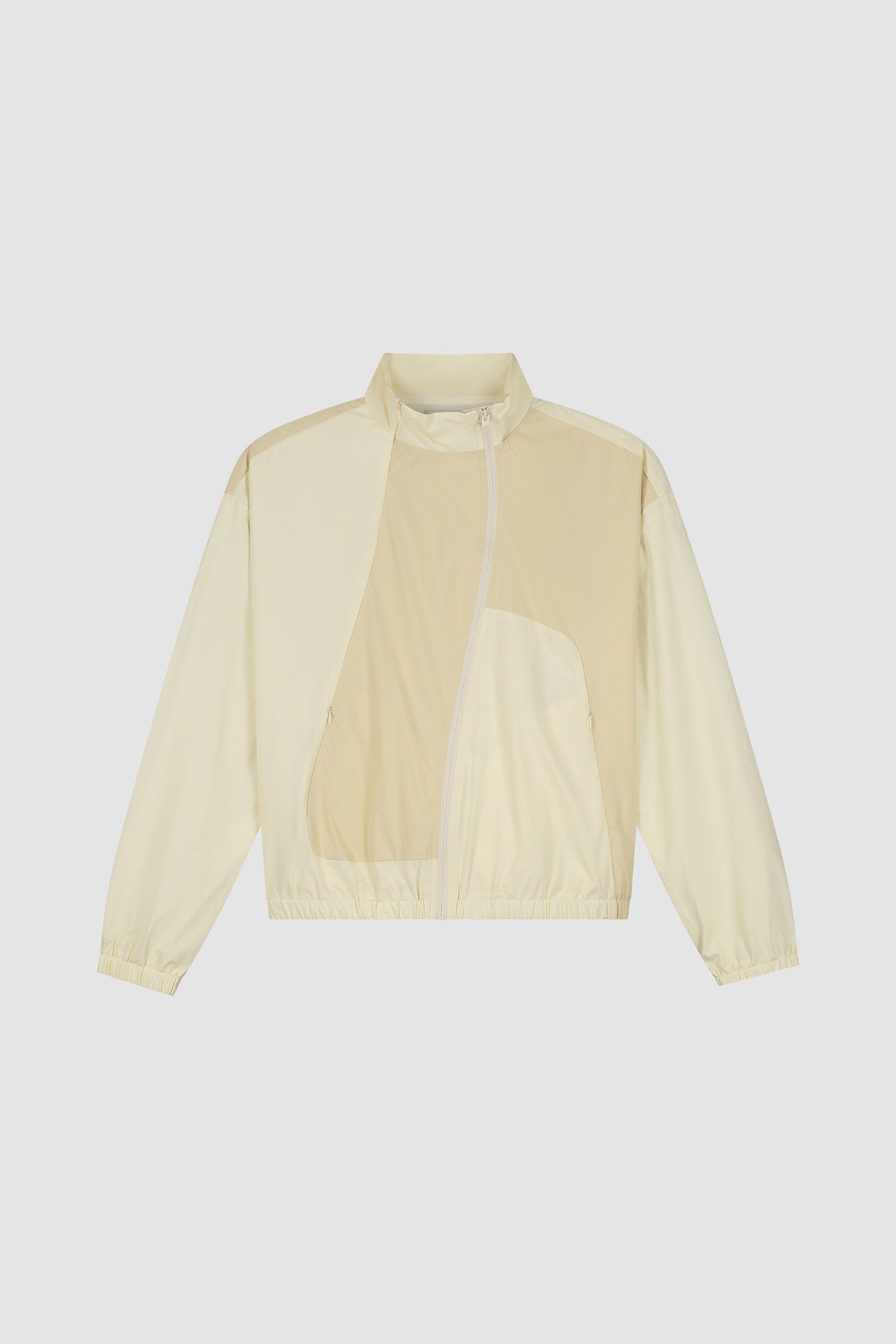 Veste zippée courbée couleur crème, vue de face