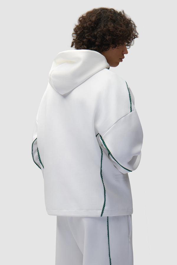 Arte for adidas Z.N.E. Jacket in White/Better Scarlet worn by a model, half-body back view