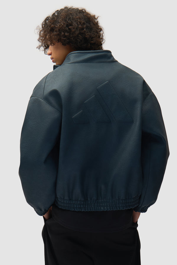 Arte for adidas Faux Leather Jacket in Navy worn by a model, half-body front view