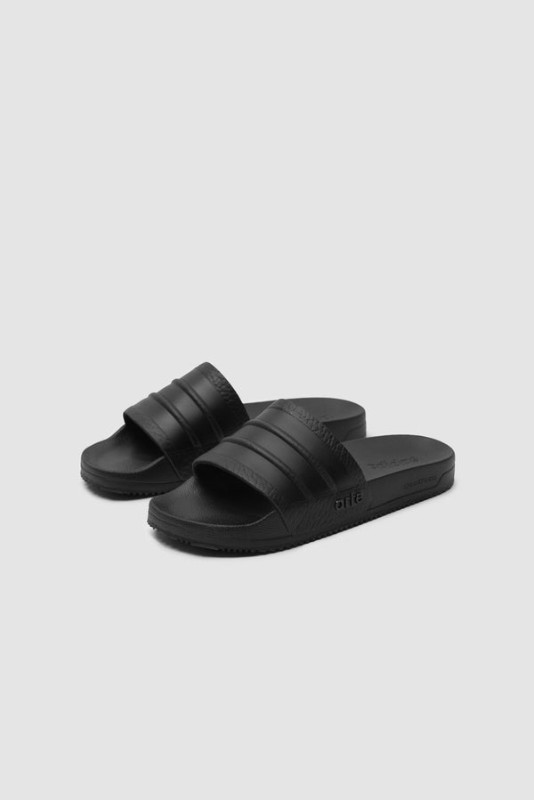 Arte for adidas Adilette in Core Black, pair front view