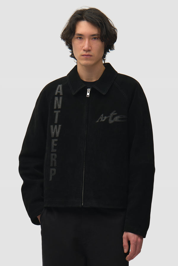 Leather Patches Jacket in Black worn by a model, half-body front view