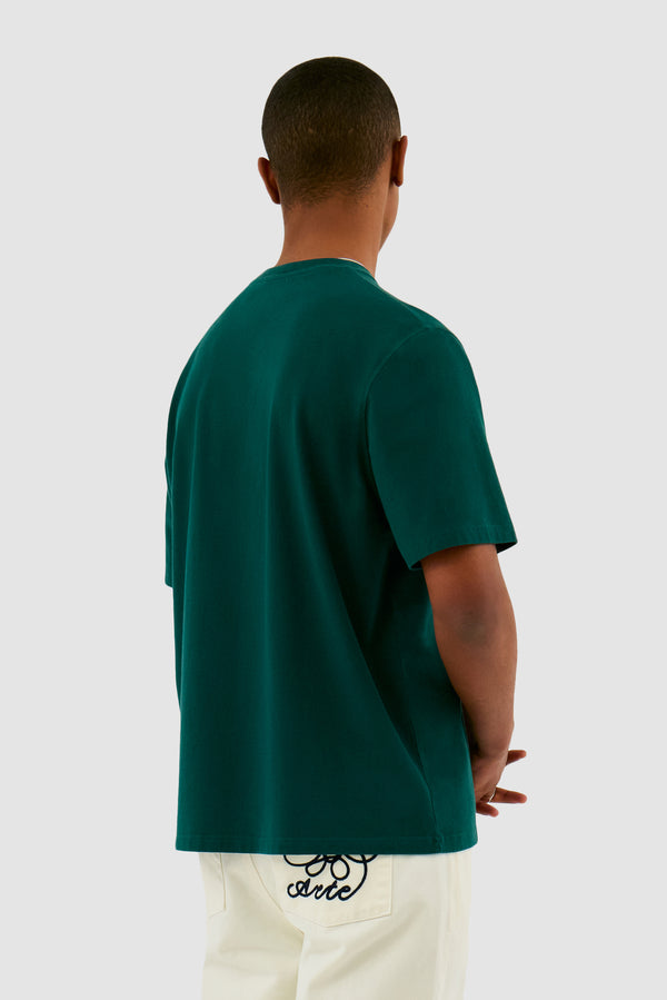 Heart Logo T-shirt in Green worn by a model, half-body back view