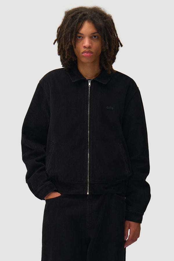 Corduroy Jacket in Black worn by a model, half-body front view