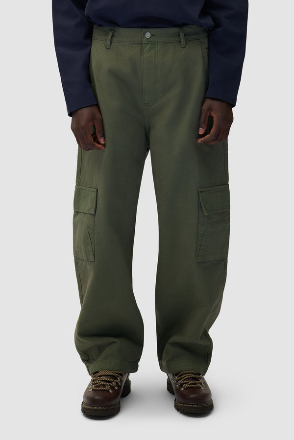 Low Cargo Pants in Green worn by a model, half-body front view