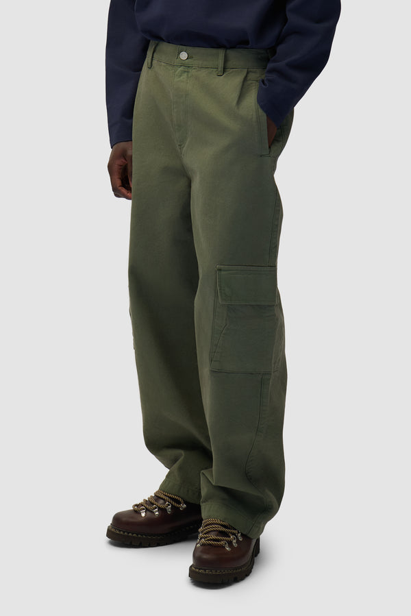 Low Cargo Pants in Green worn by a model, half-body back view