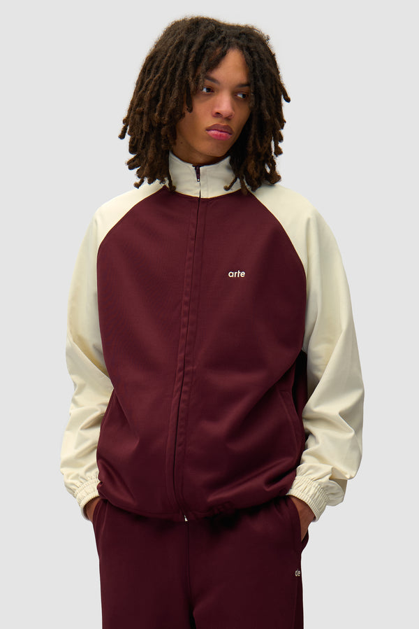 Carded Tracksuit Top in Bordeaux/Cream worn by a model, half-body front view
