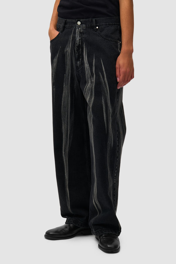 Washed Jeans Pants in Black Denim worn by a model, half-body front view