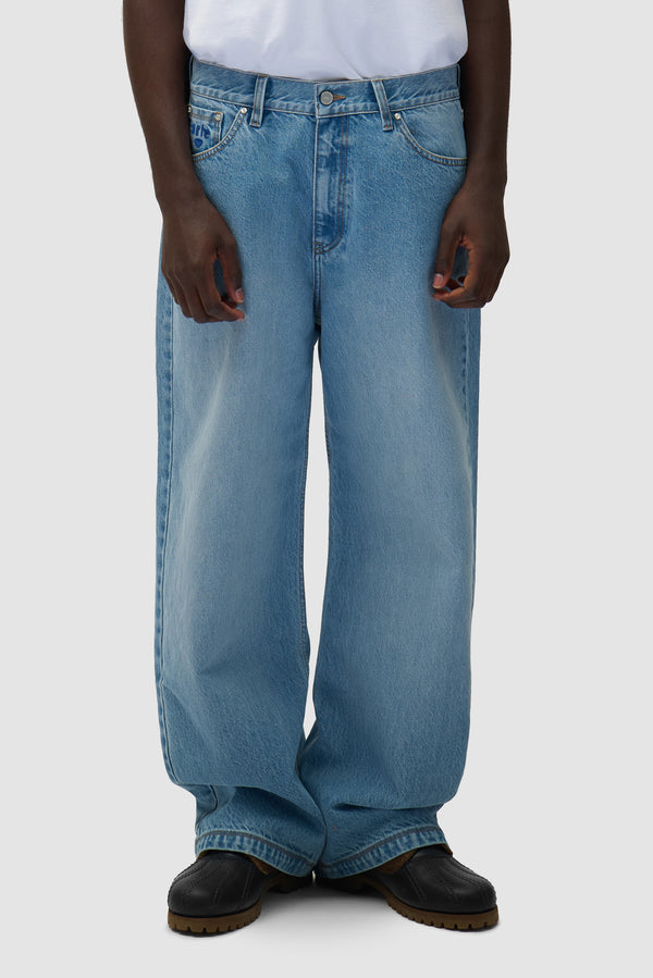 Basic Jeans Pants in Bleach worn by a model, half-body front view