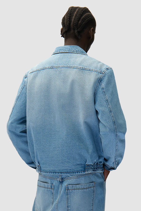 Heart Logo Jacket in Bleach worn by a model, half-body back view