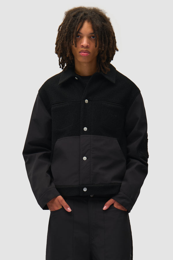 Nylon/Wool Combo Jacket in Black worn by a model, half-body front view
