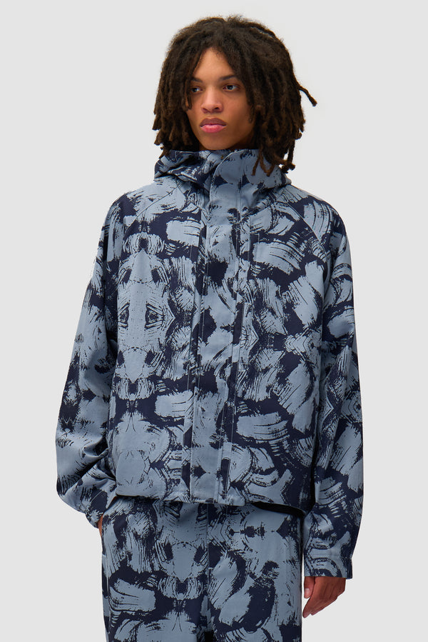 Scratch Technical Jacket in Blue worn by a model, half-body front view