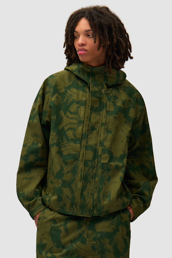 Scratch Technical Jacket in Green worn by a model, half-body front view