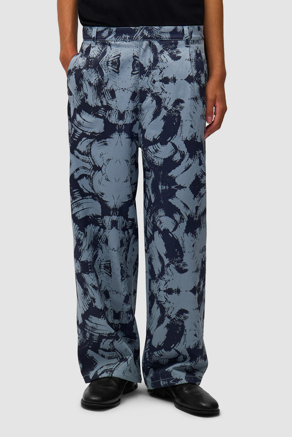 Scratch Technical Pants in Blue worn by a model, half-body front view