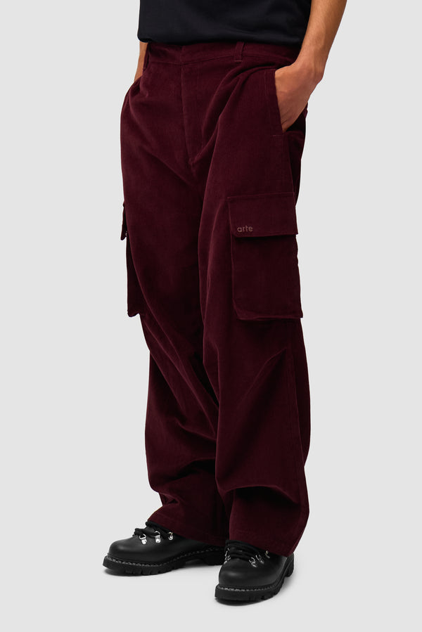 Corduroy Cargo Pants in Bordeaux worn by a model, half-body front view