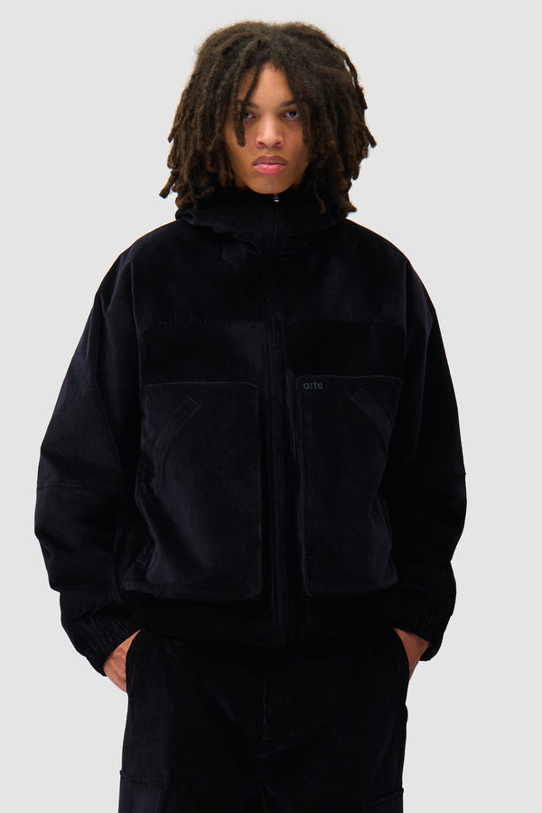 Corduroy Technical Jacket in Navy worn by a model, half-body front view