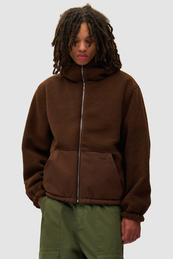 Nylon Technical Jacket in Brown worn by a model, half-body front view